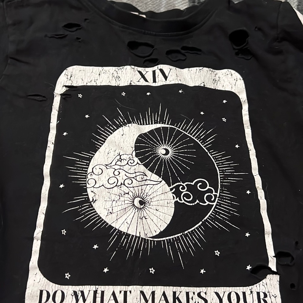 holed shirt karma